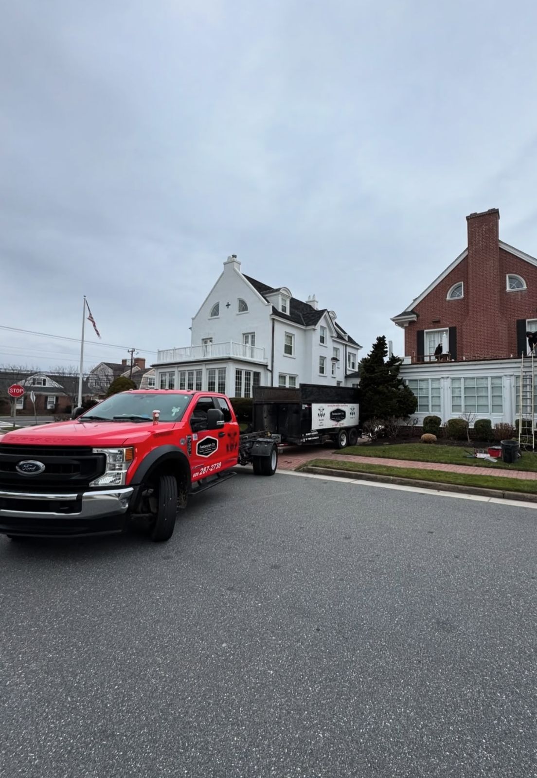 Fantazzia's Co. crew hauling debris during a property cleanout